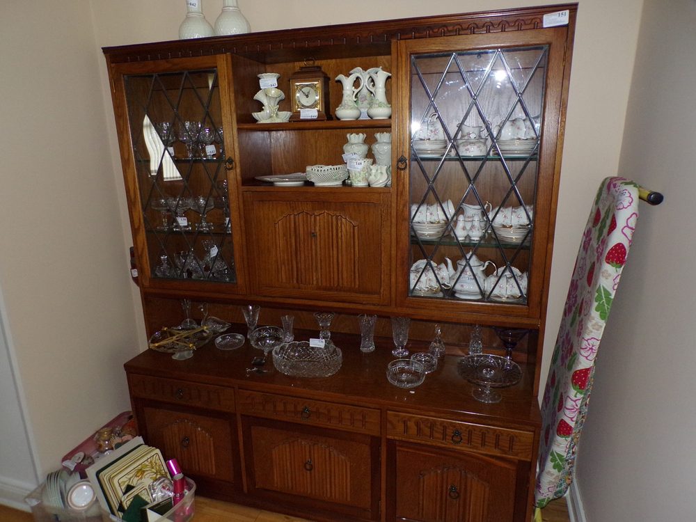 Oak display cabinet with linen-fold carving