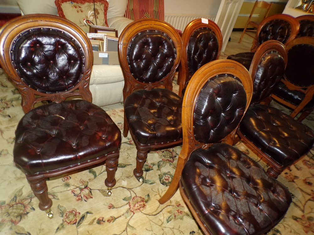 Set of 10 Victorian oak balloon-back chairs with leather buttoning