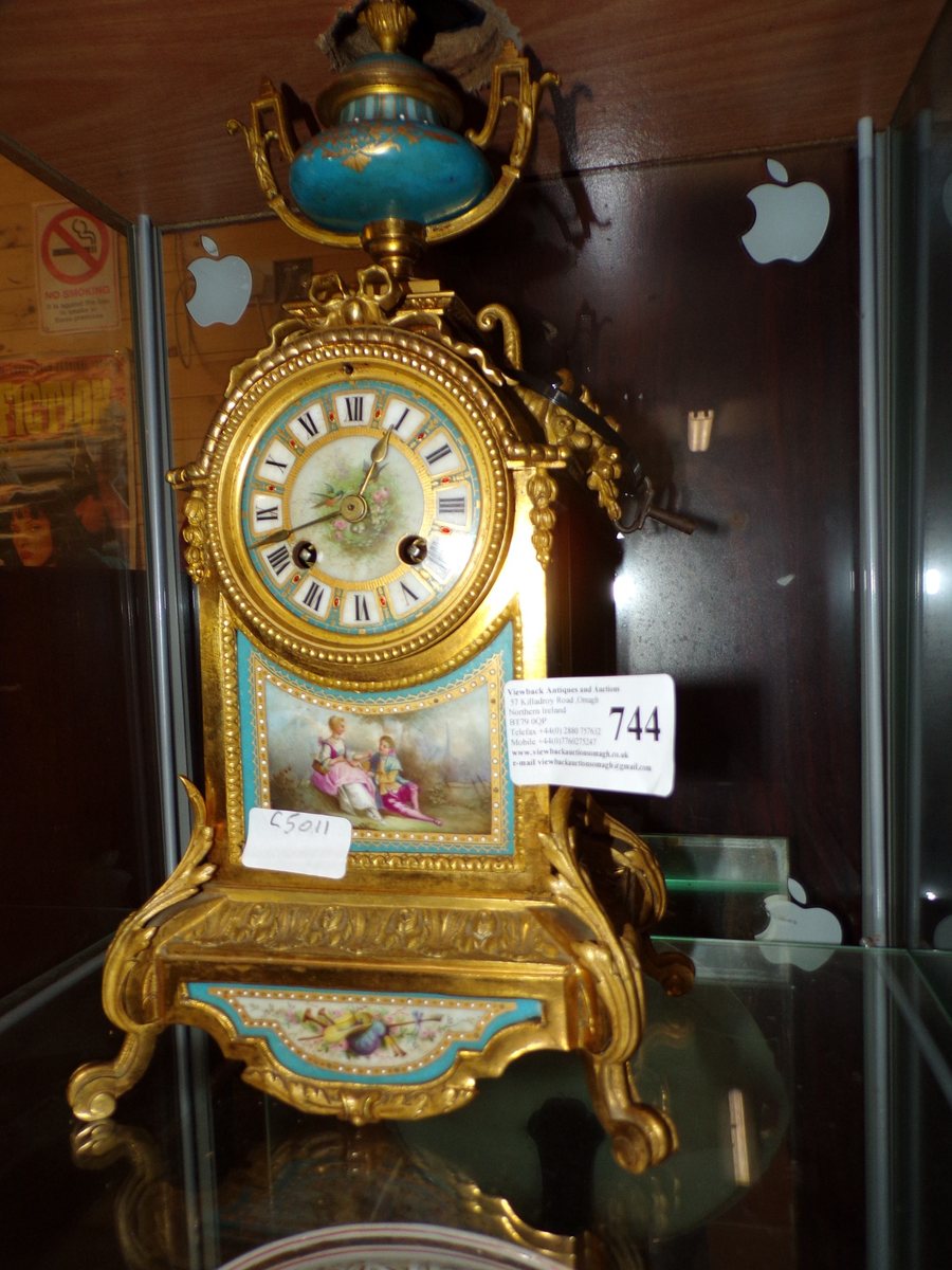 French gilt mantel clock with Sèvres porcelain panels